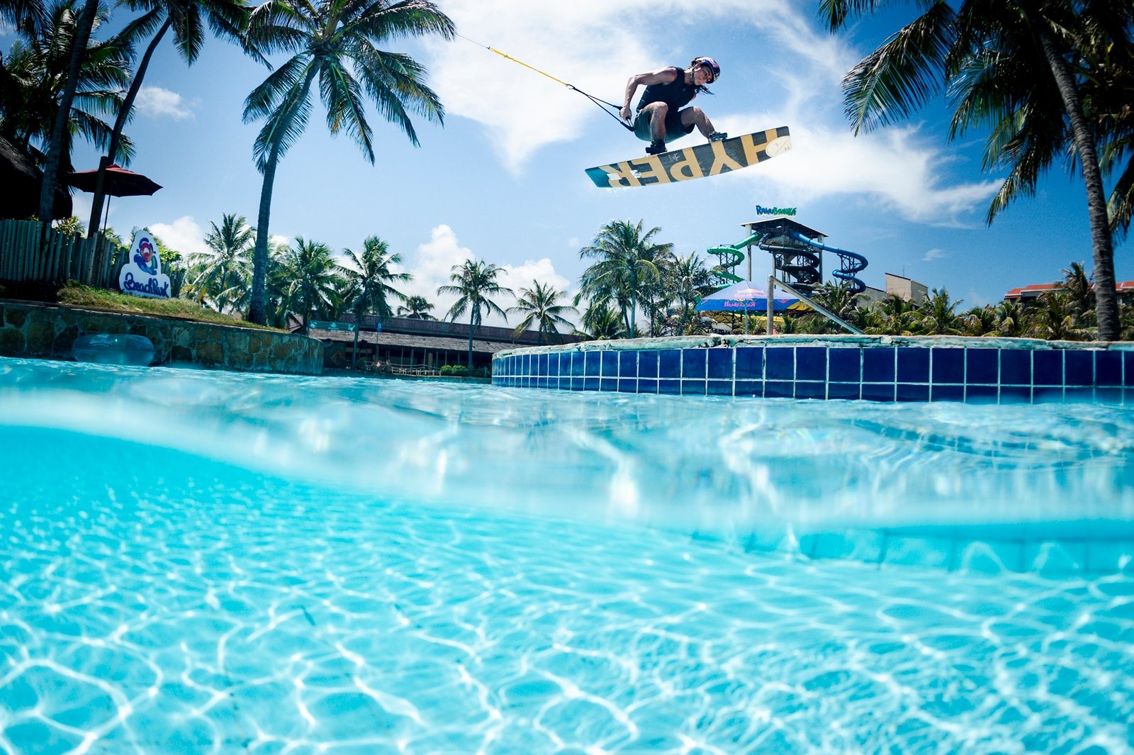 Watch Professional Red Bull Wakeboarder Pedro Caldas Take on 82-Foot Water Slide in Beach Park!