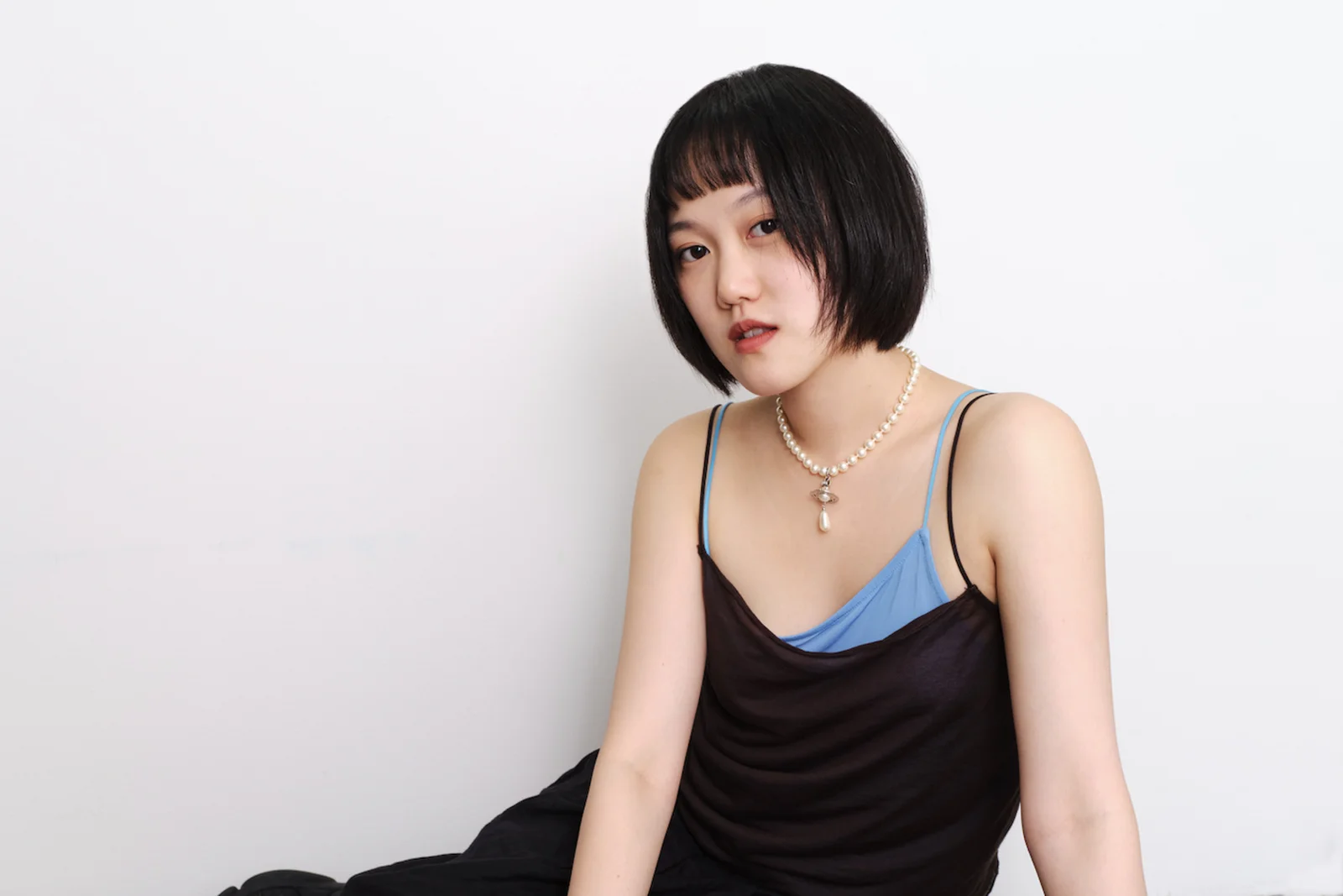 Meicheng Chi’s Evolution from Drawing Walls to Designing Fashion